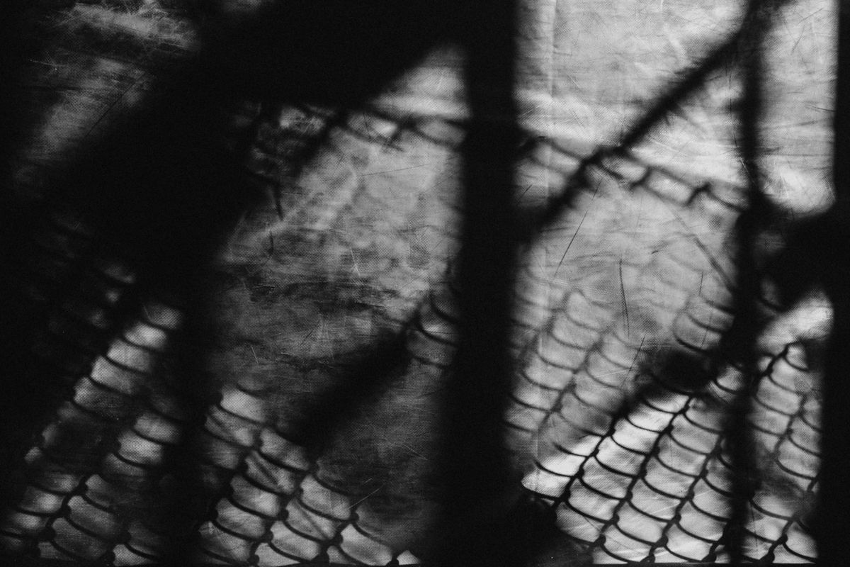 High-contrast black and white light and shadow pattern